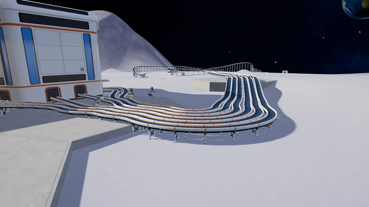 Moon Sweepers screenshot of a conveyor belt running from a machine toward a base.