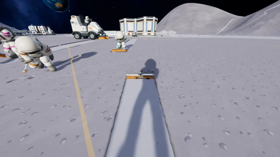 Official Moon Sweepers screenshot showing a player brushing a clean strip while other astronauts work nearby.